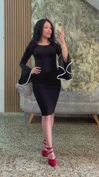 Vestido Midi Negro Manga Campana con Detalle en Contraste Elegante y Moderno